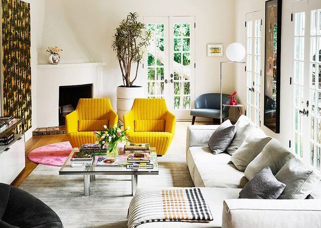 Living room with yellow chairs
